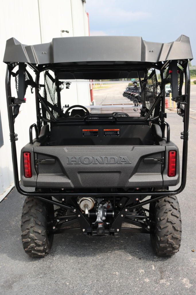Front view of the 2026 Honda Pioneer 700-4 Deluxe in Black Forest Green