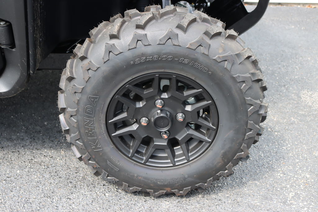 Passenger-side view of the 2026 Honda Pioneer 700-4 Deluxe
